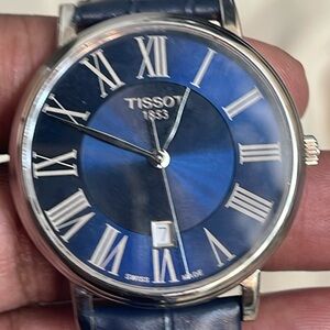 Tissot …Swiss made, water resistant, sapphire crystal , stainless steel
